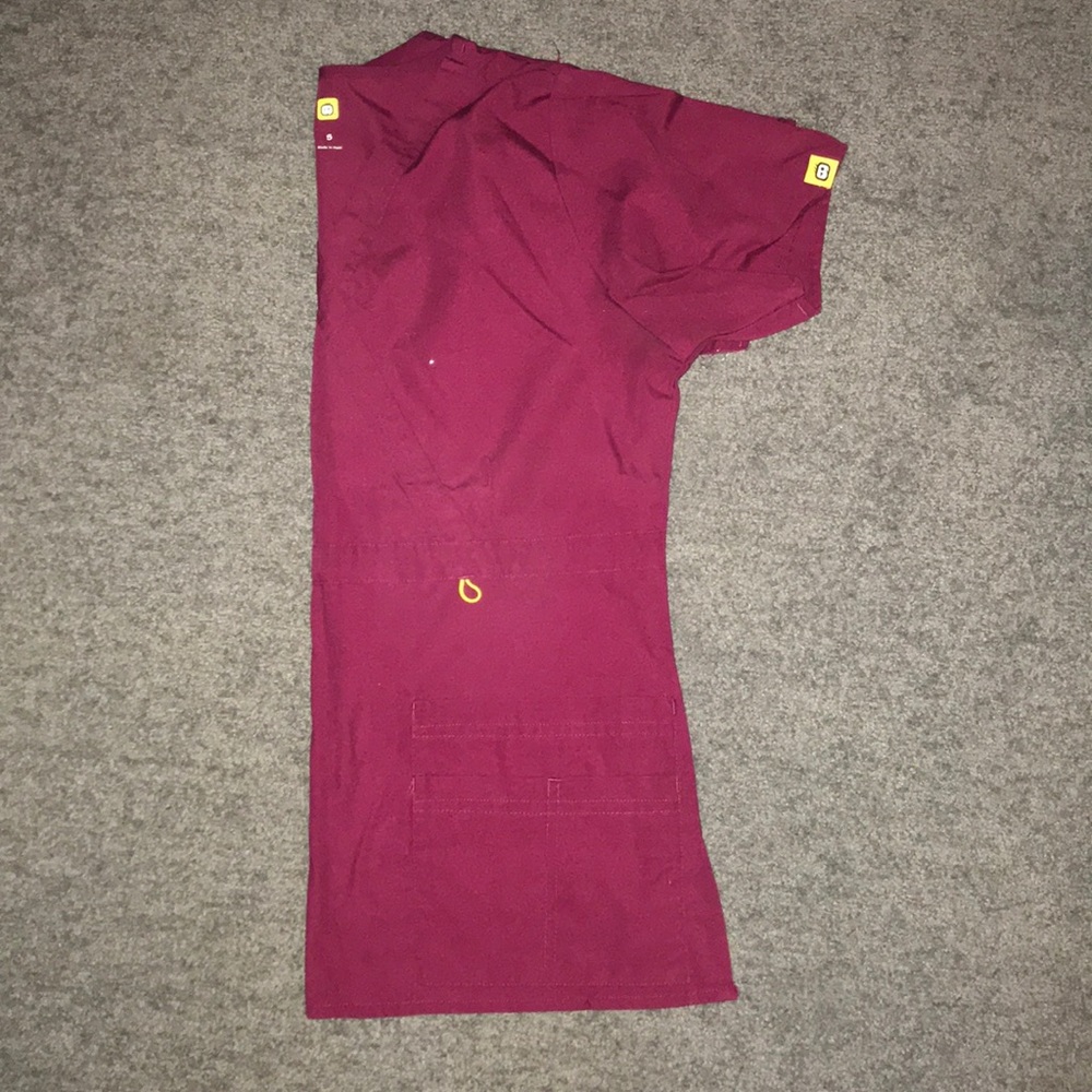 Maroon scrub tops and bottoms